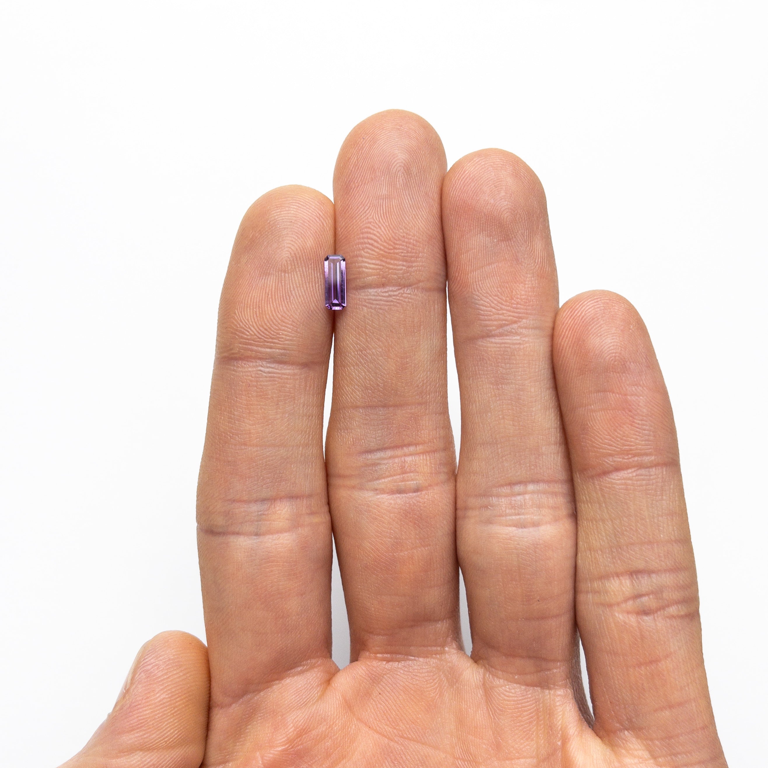 Elongated step - cut Violet Sapphire - 12th HOUSE