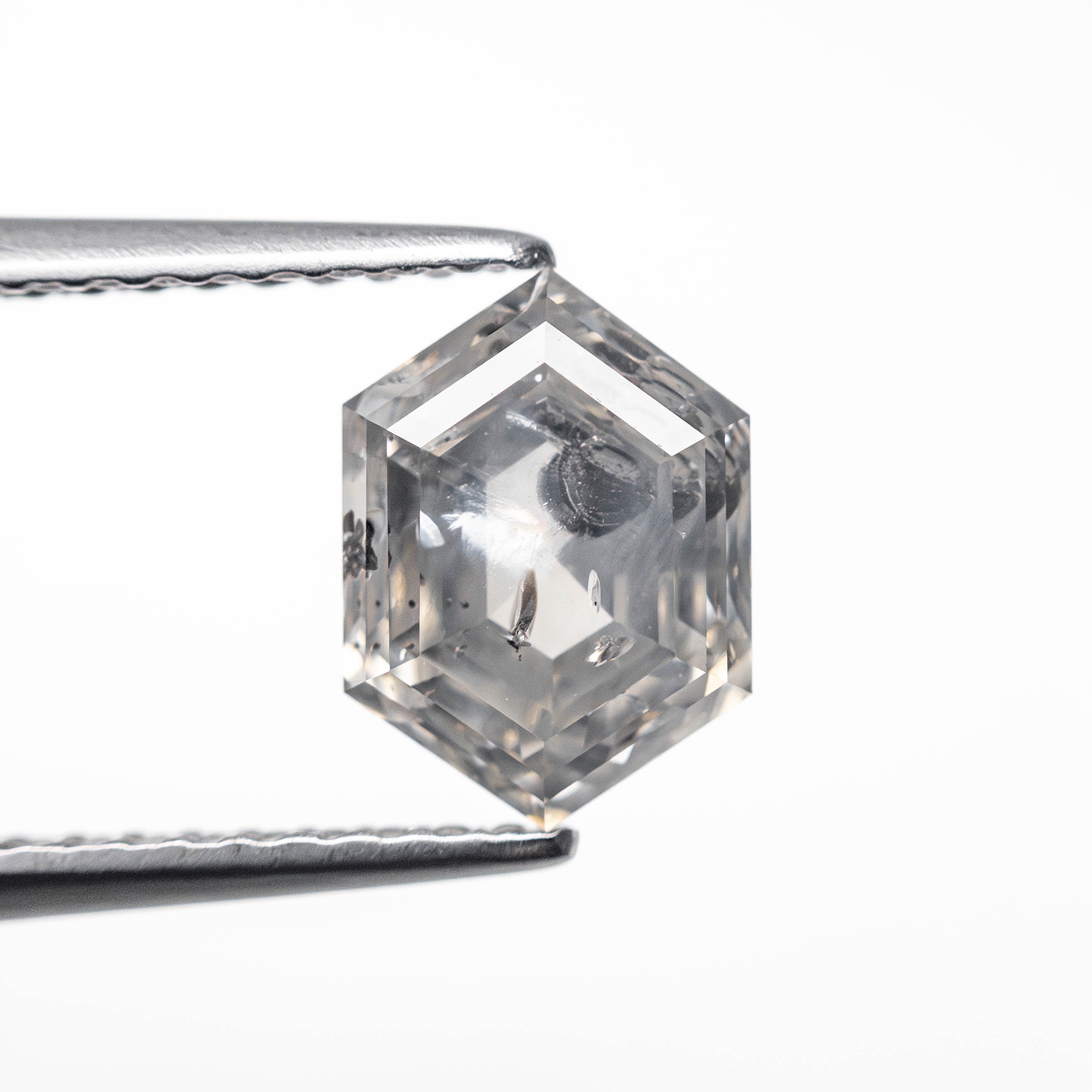 Hexagonal step cut diamond - 12th HOUSE