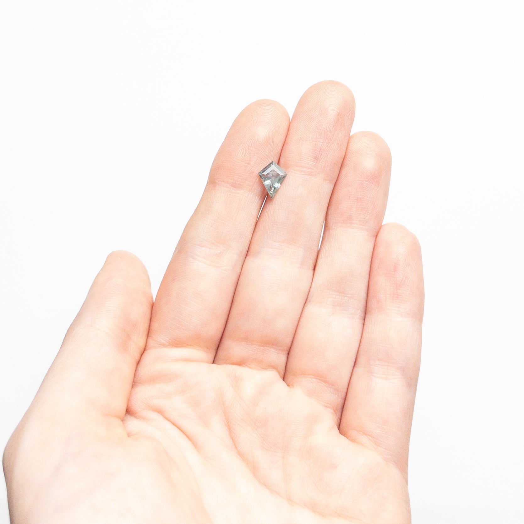 Icy teal Kite step cut sapphire - 12th HOUSE