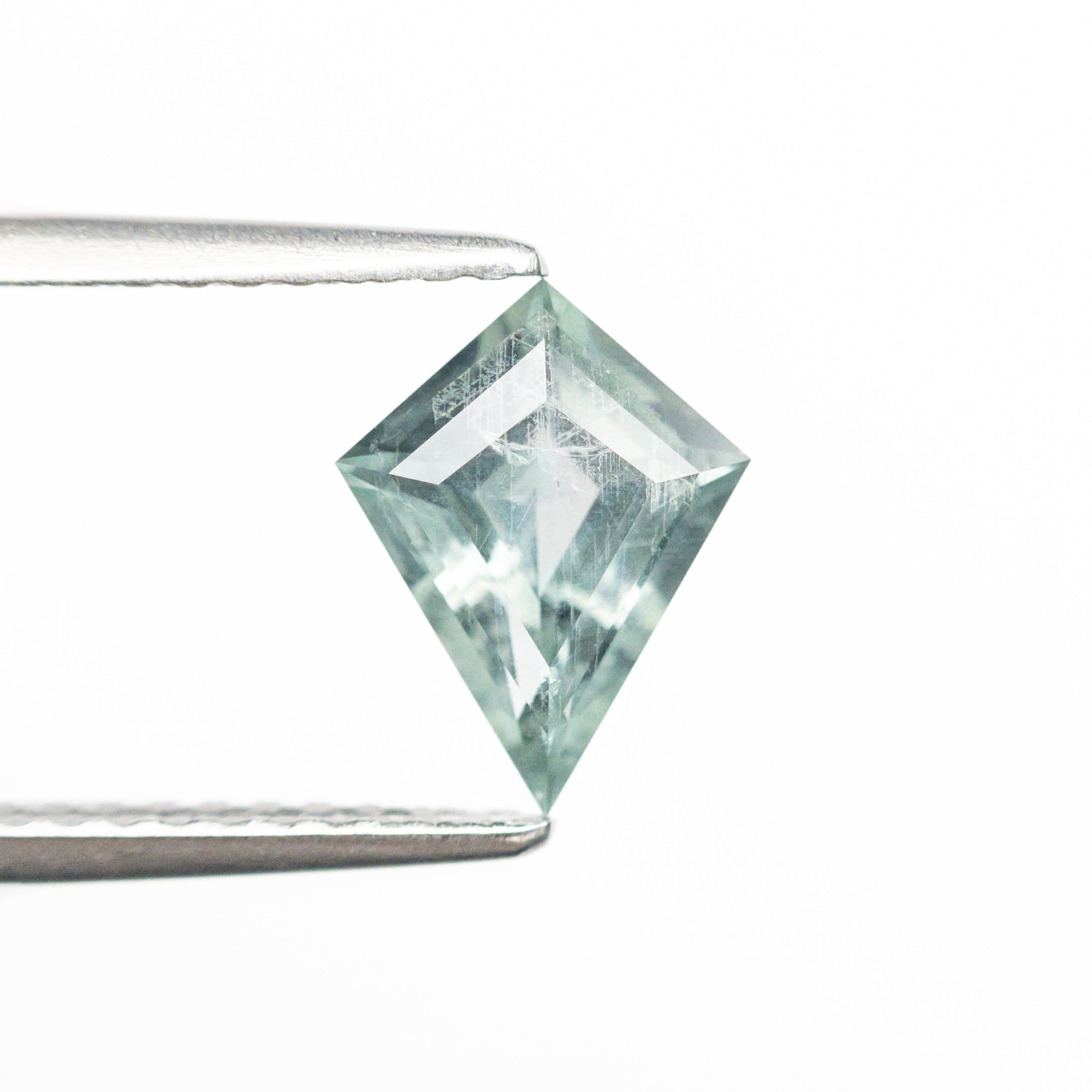 Icy teal Kite step cut sapphire - 12th HOUSE