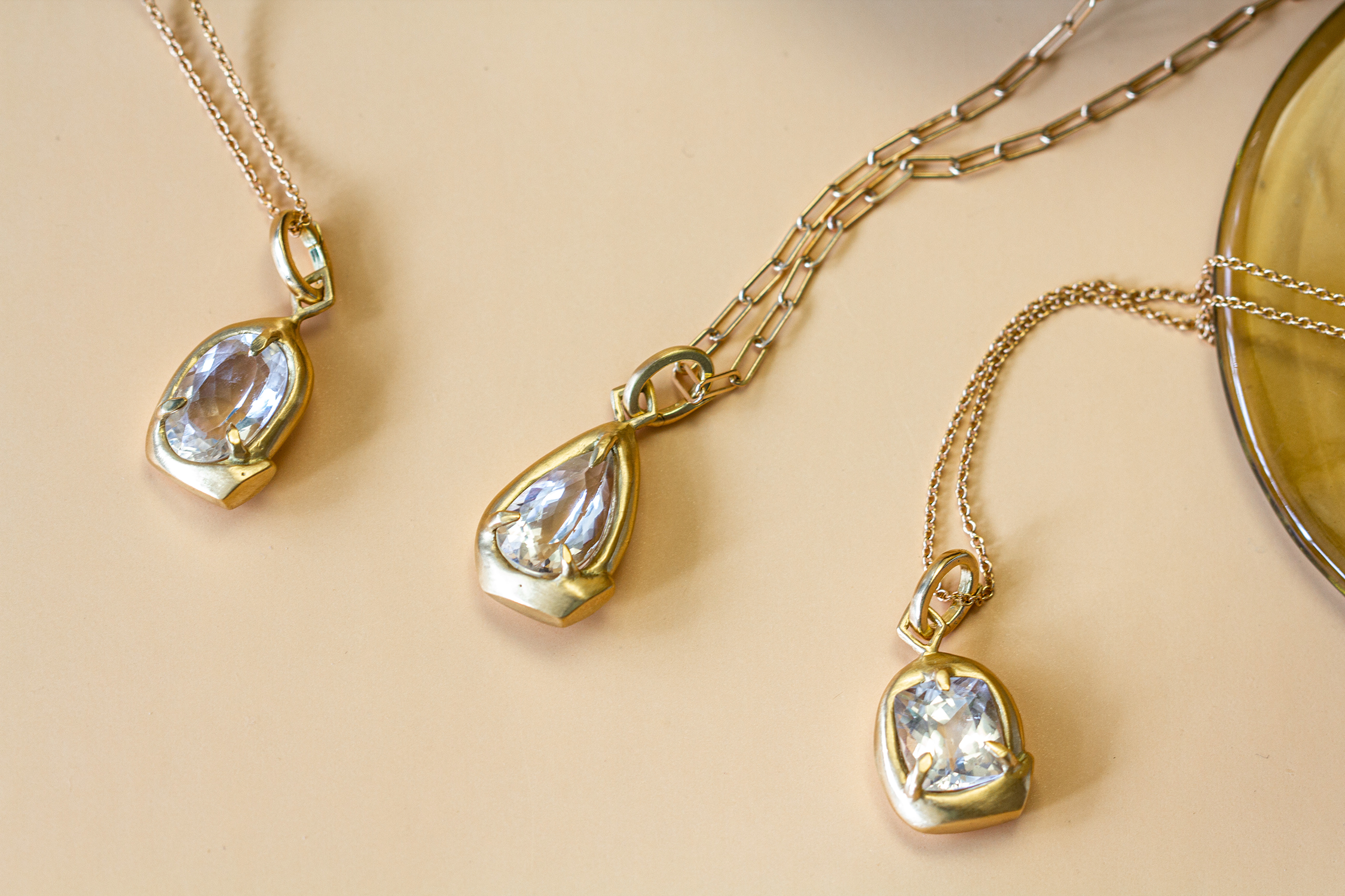 18k gold fine jewelry by 12th HOUSE, phenakite ouroboros amulets and talismans, made for magic seekers