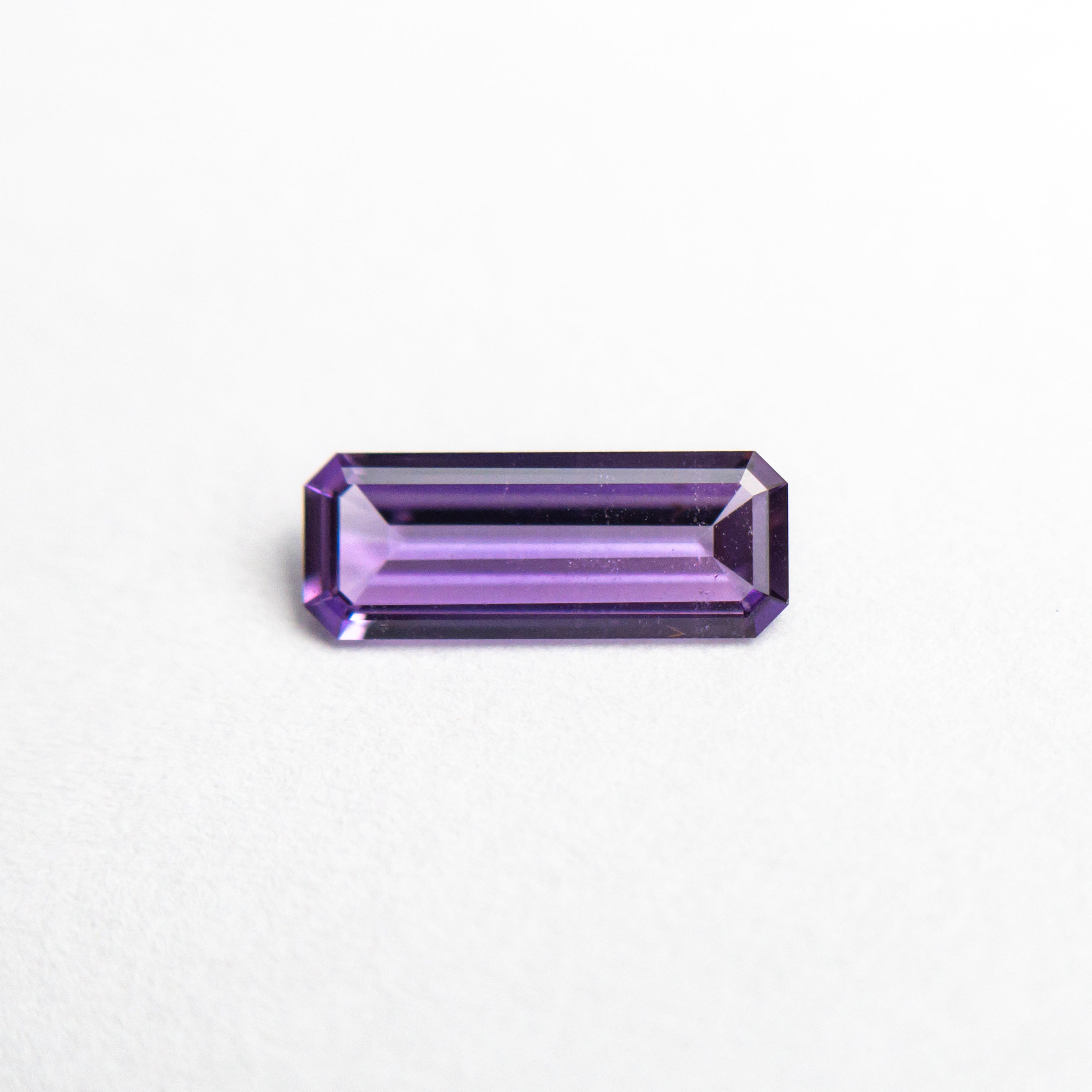 Elongated step - cut Violet Sapphire - 12th HOUSE