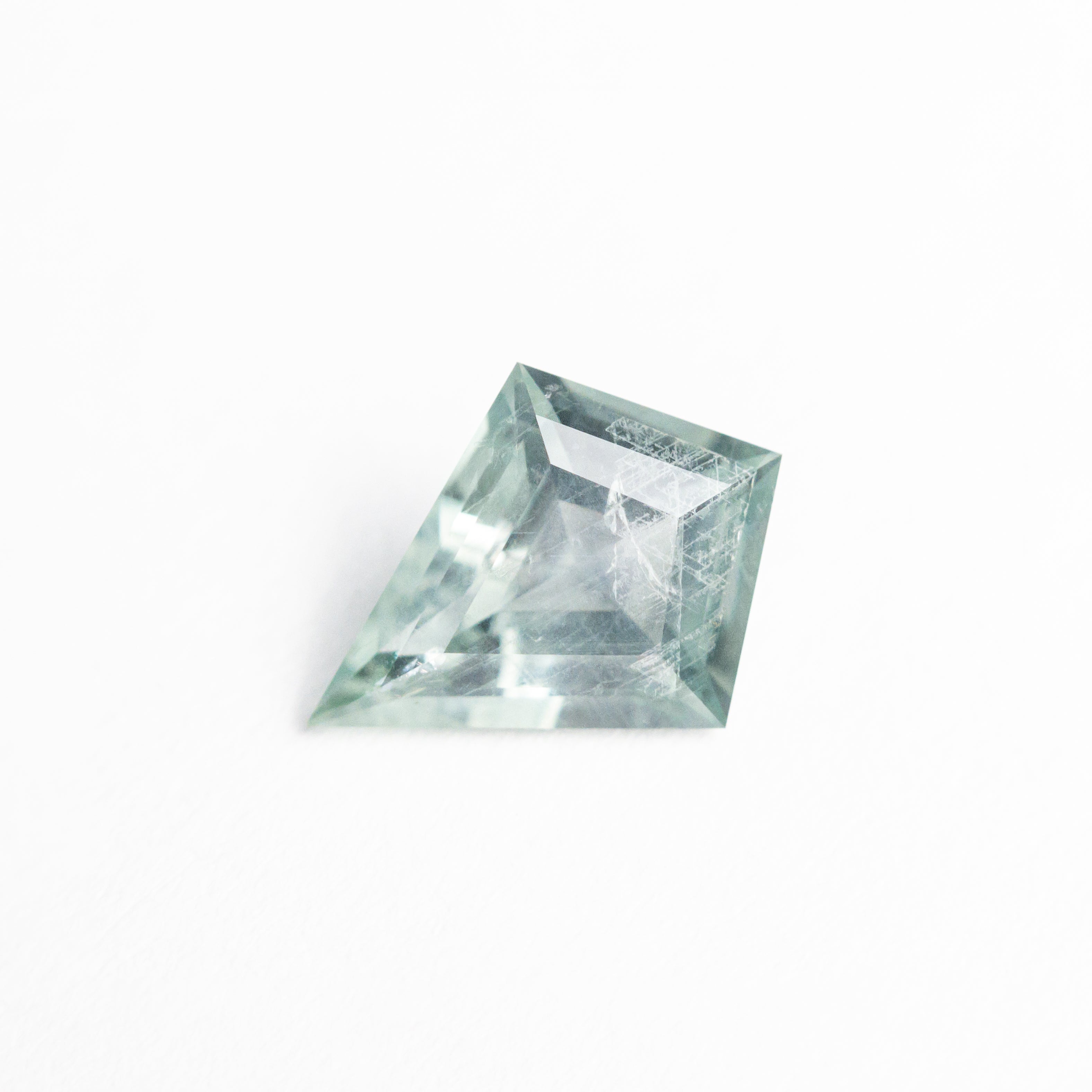 Icy teal Kite step cut sapphire - 12th HOUSE