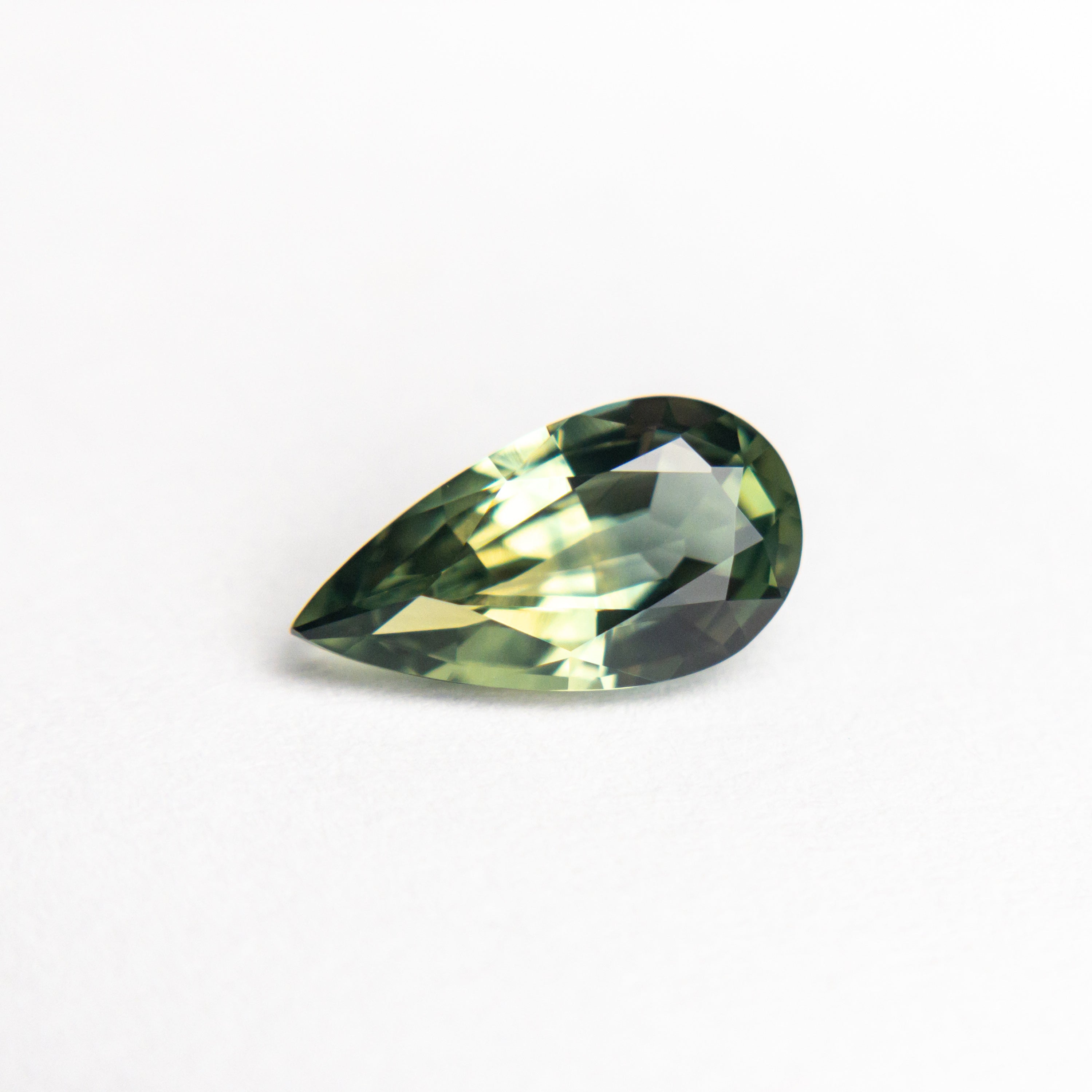12th HOUSE loose gemstone 0.86ct Teal green pear sapphire